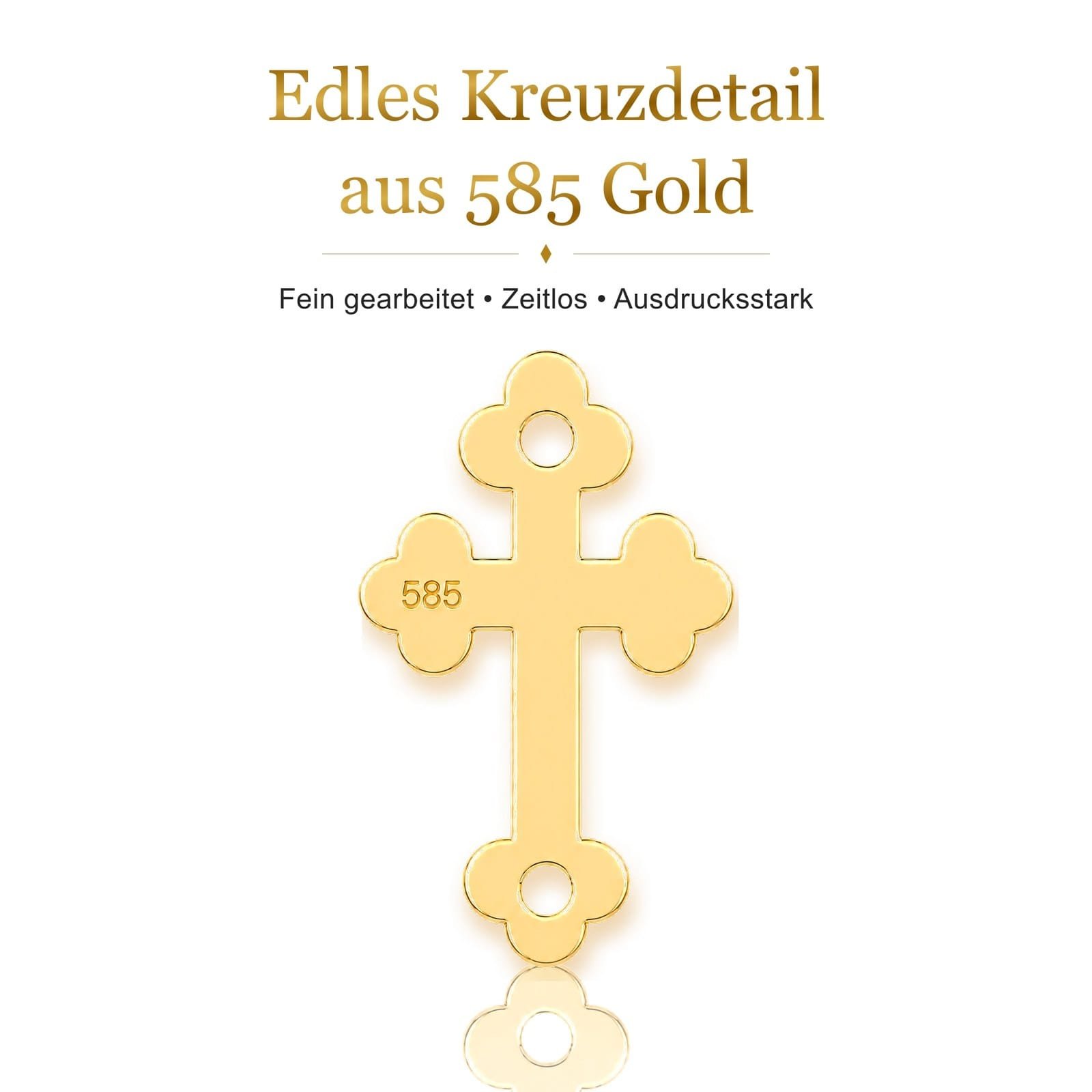 Kreuzanhänger aus 585 Gold im Detail Kleines Kreuz aus 585er Gold mit Punzierung, Detailaufnahme